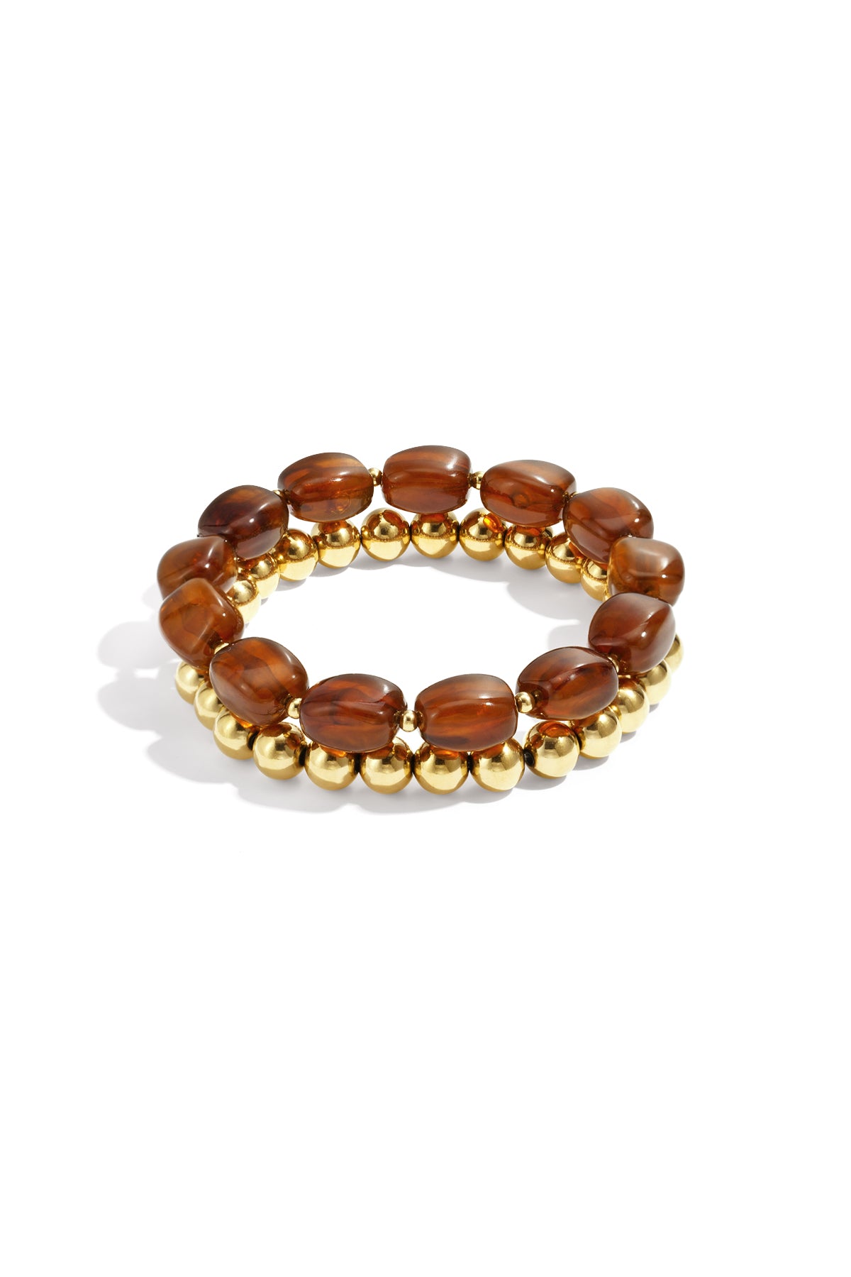 Close-up of a dark brown marbled acrylic beaded bracelet alongside a shiny gold-tone beaded bracelet on white background