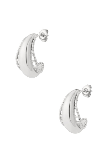 Pair of sleek silver dome hoop earrings with chain-link textured edge isolated on white background