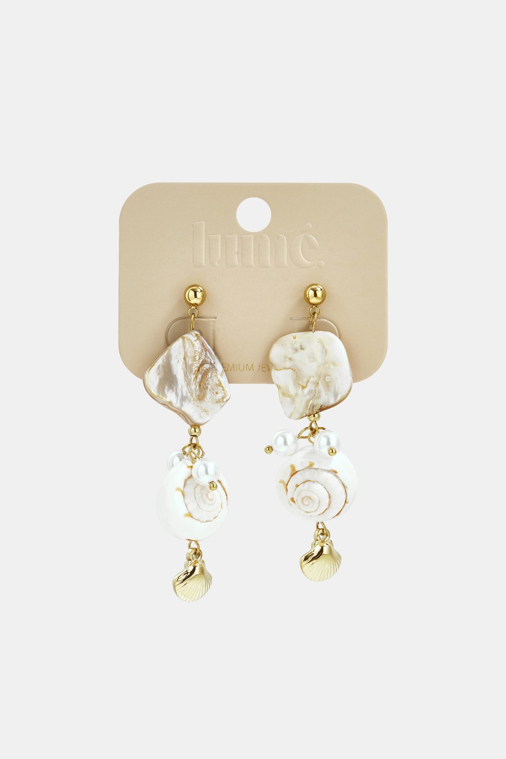 Coastal dangle earrings featuring gold-tone hardware, white shell charms, irregular mother-of-pearl accents, and pearls.