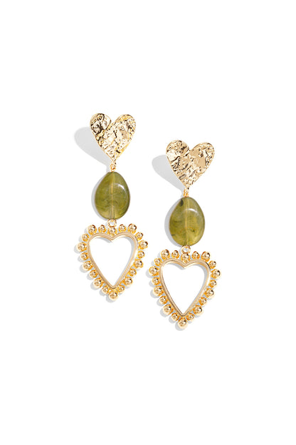 Pair of heart drop statement earrings with hammered gold hearts, olive green marbled resin beads, and gold beaded open heart frames on white background