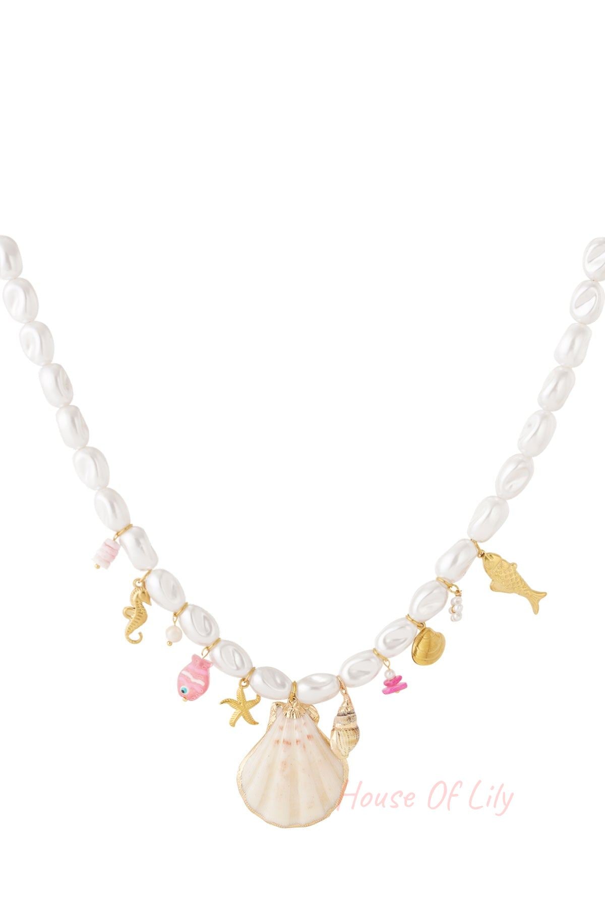 White faux pearl necklace with gold-tone seafood charms including scallop shell, starfish, seahorse, and pink fish accents on a plain white background