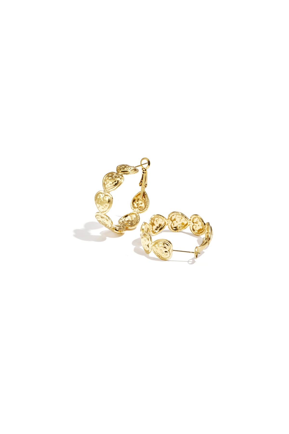 Pair of gold hoop earrings composed of small embossed hearts arranged in a circle on a white background