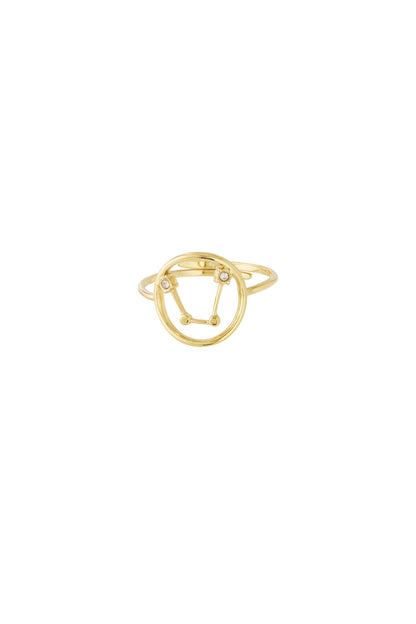 Gold ring with constellation constellation motif adorned with rhinestones on a white background