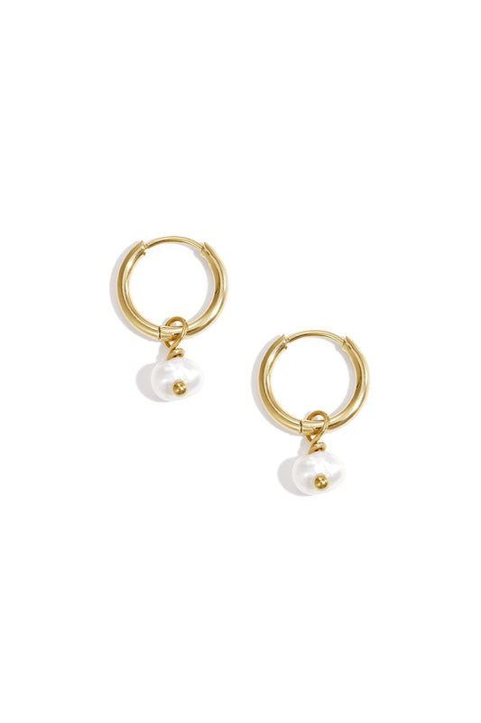 Pair of gold hoop earrings each featuring a single white pearl charm dangling elegantly.