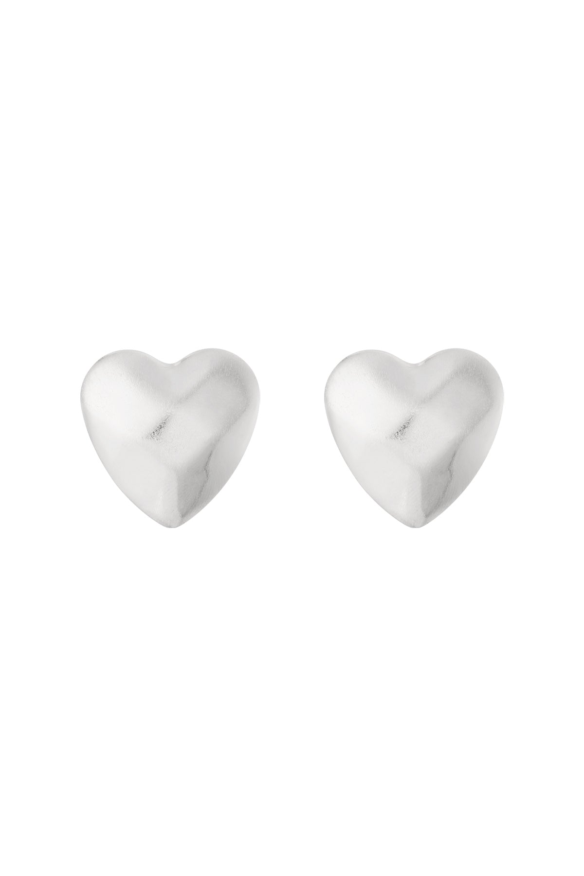 Pair of matte silver heart-shaped stud earrings on white background
