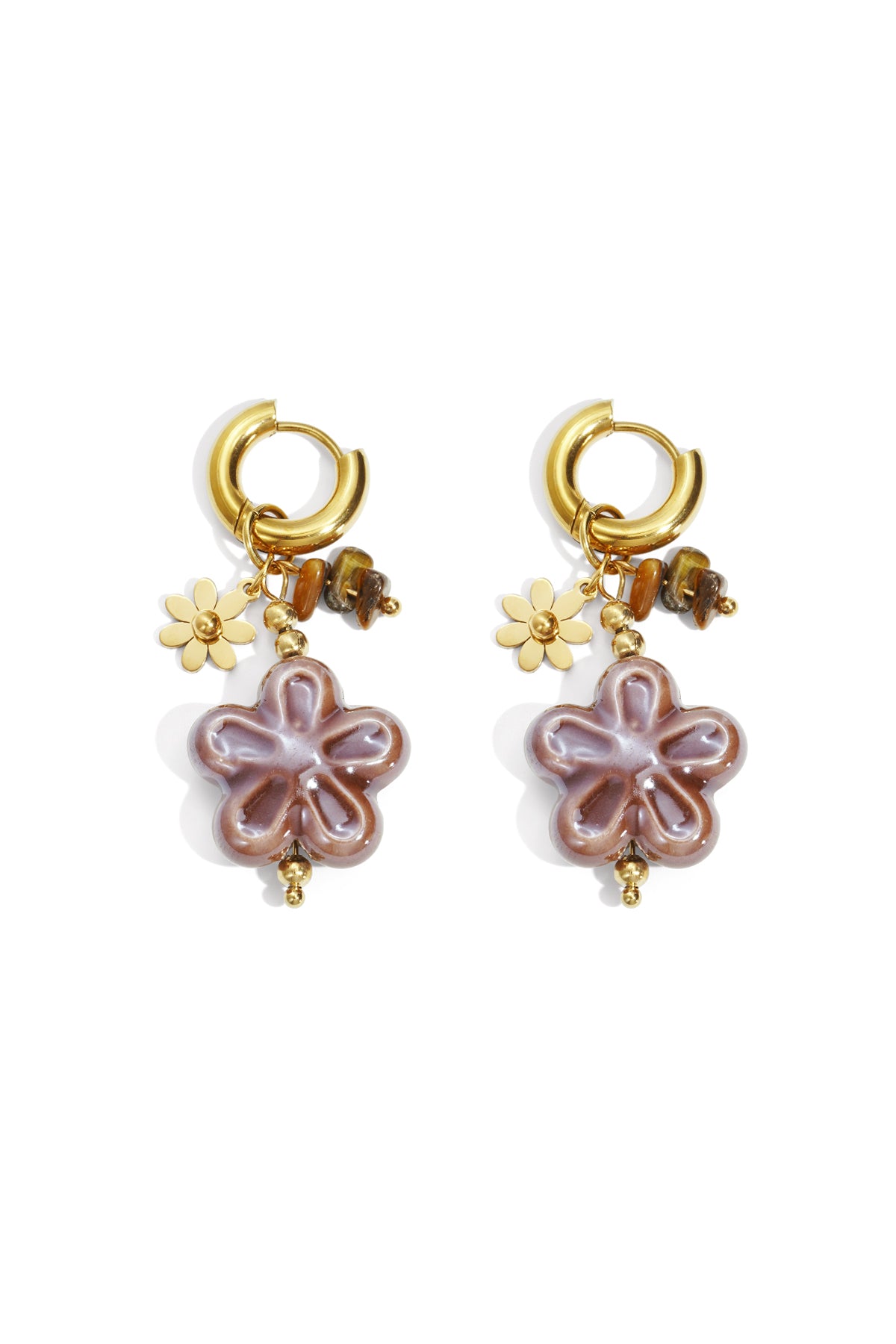 Pair of gold hoop earrings with mauve-lilac resin flower charms and matching bead accents displayed on white background