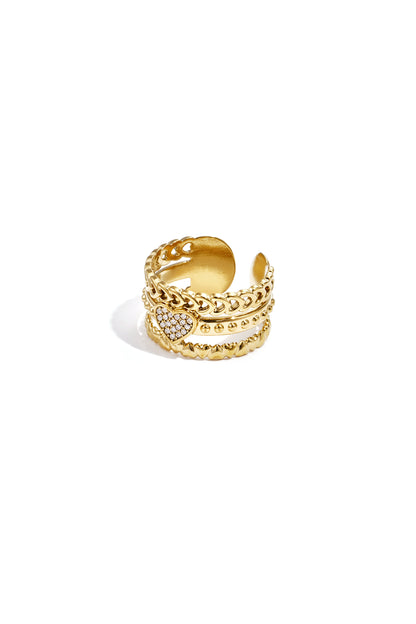 Gold multi-chain statement ring featuring a sparkling rhinestone heart on an adjustable band