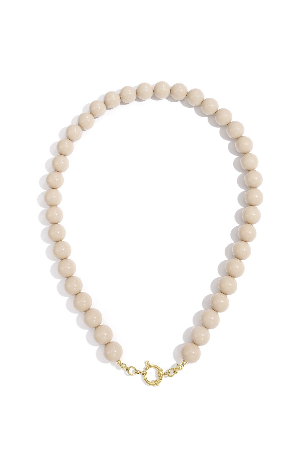 Beige resin beaded necklace featuring smooth, round beads and a gold-tone circular toggle clasp.
