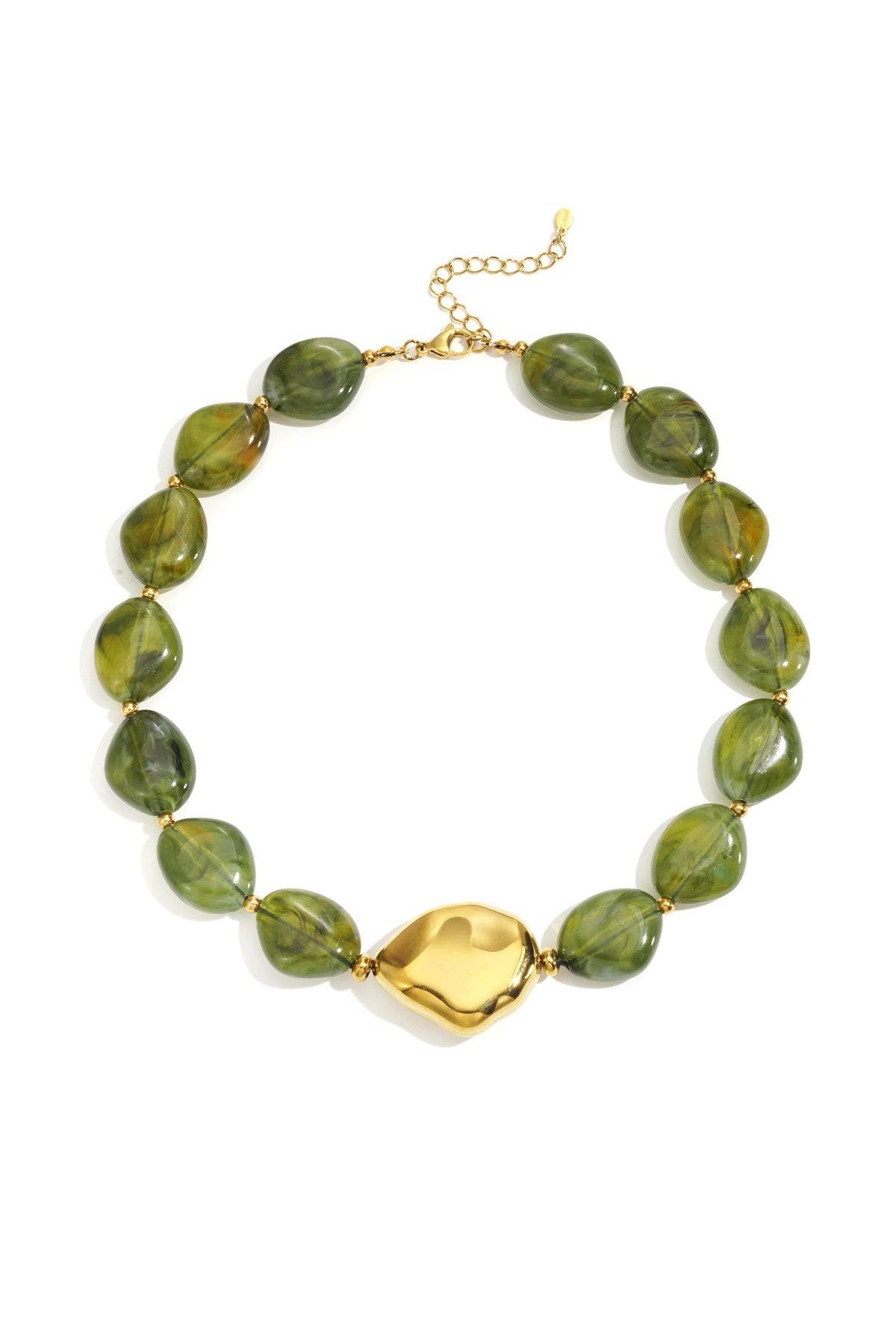 Flat lay image of earthy green acrylic beaded necklace with bold gold statement bead on white background
