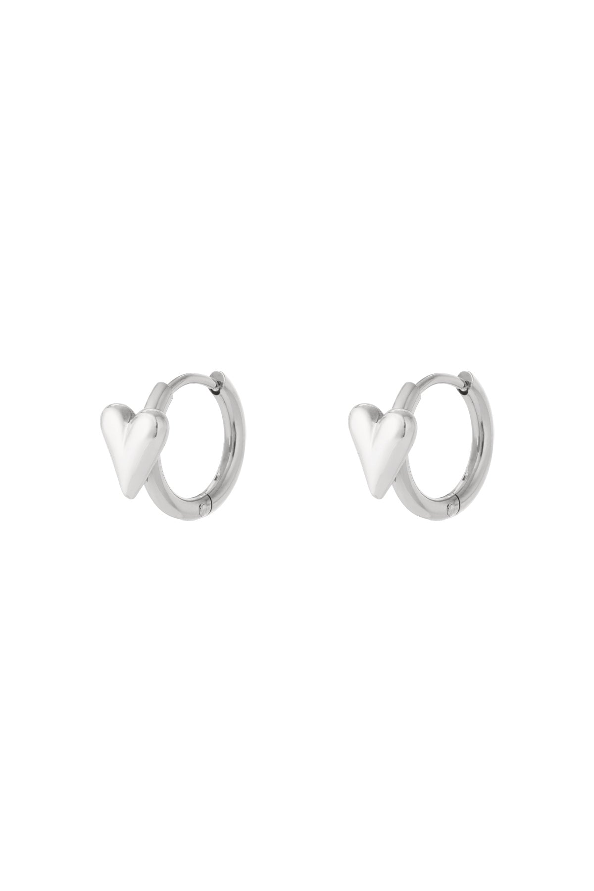 Pair of silver heart hoop earrings displayed on white background
