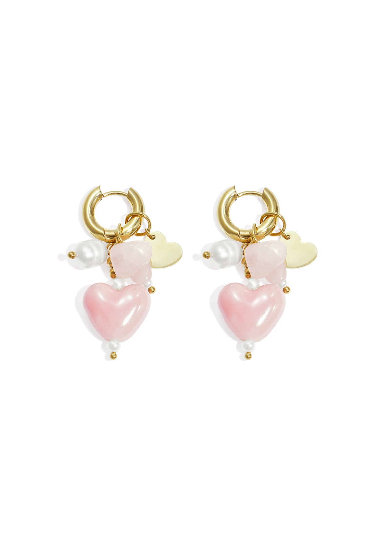 Pair of gold-tone hoop earrings with light pink heart charms, natural stone accents, and faux pearls on white background