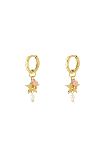 Pair of gold hoop earrings with star charms, white pearl drops, and light pink beads on white background