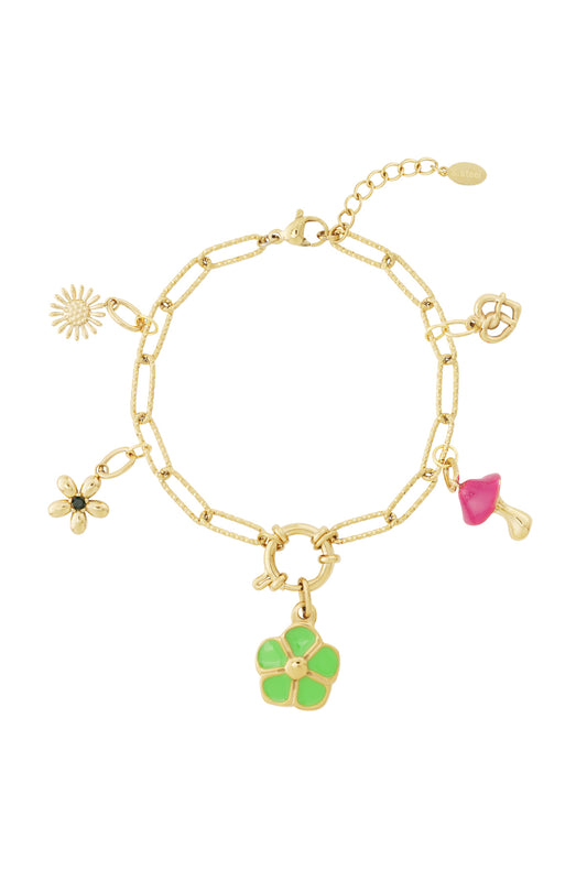 Adjusted view of gold charm bracelet with colorful flower, heart, and mushroom charms arranged around the chain on a white background