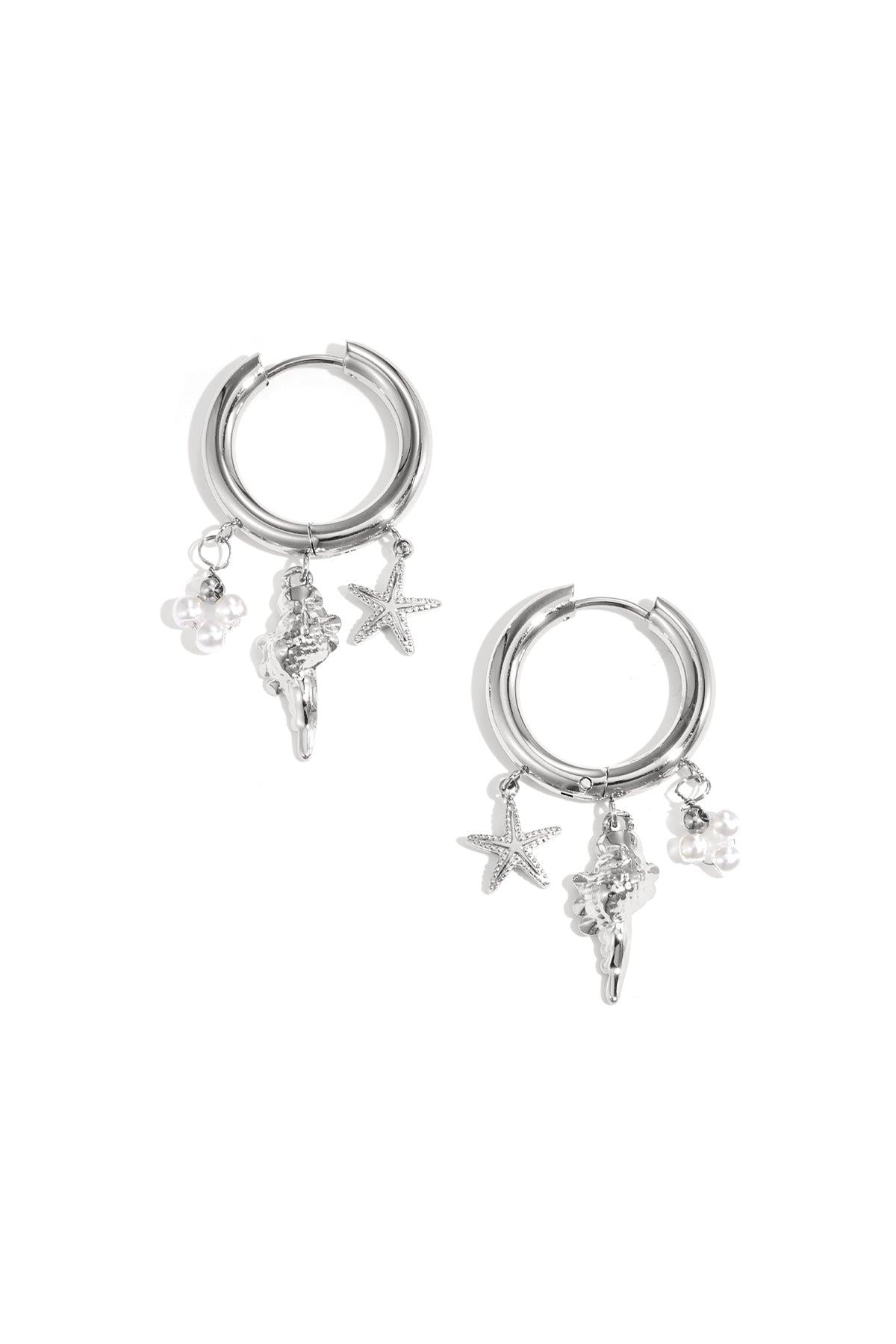Silver-plated hoop earrings with dangling starfish, seashell, and pearl charms on white background