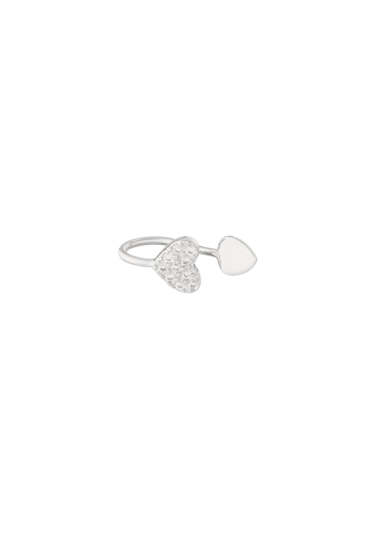 Close-up image of a silver-tone open heart ear cuff featuring one heart adorned with clear zircon crystals and the other smooth and polished