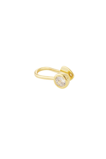 Gold-toned nose and ear cuff with sparkling zircon stone, isolated on white background