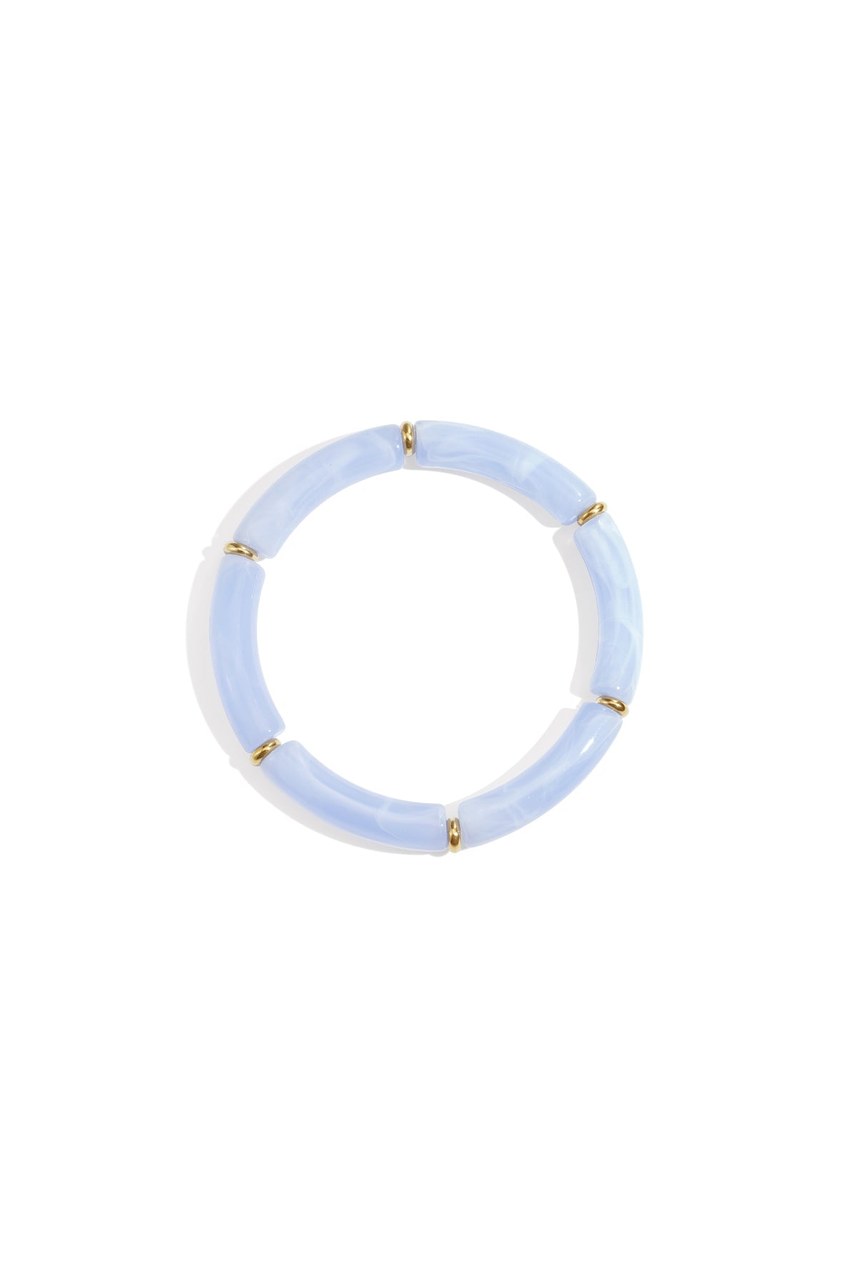 Baby blue resin tube bracelet with gold-tone ring spacers on white background