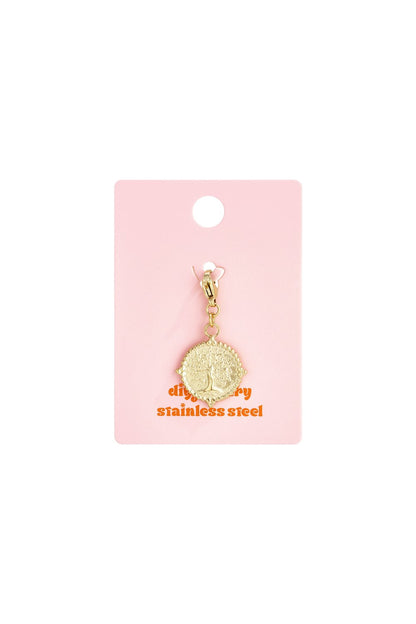 Gold Life Charm featuring a round, textured-edge gold pendant with a tree of life design on a pink display card.