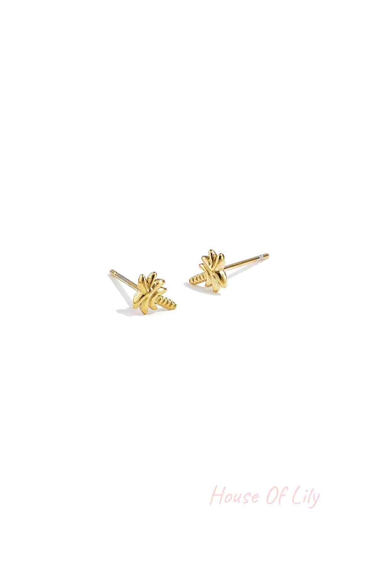 Pair of gold-tone palm tree stud earrings displayed on white background