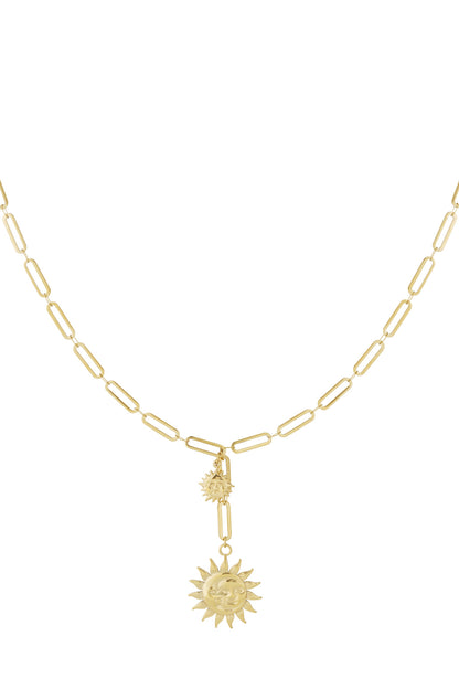 Gold dual sun pendant necklace with elongated chain links on white background