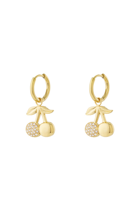 Pair of gold cherry drop earrings with rhinestone accented cherries hanging from smooth hoop earrings on white background