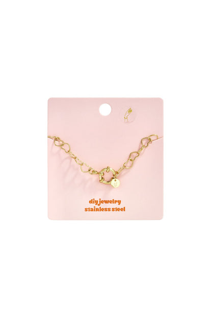 Gold stainless steel Love Link chain necklace featuring heart-shaped links on a pink display card.