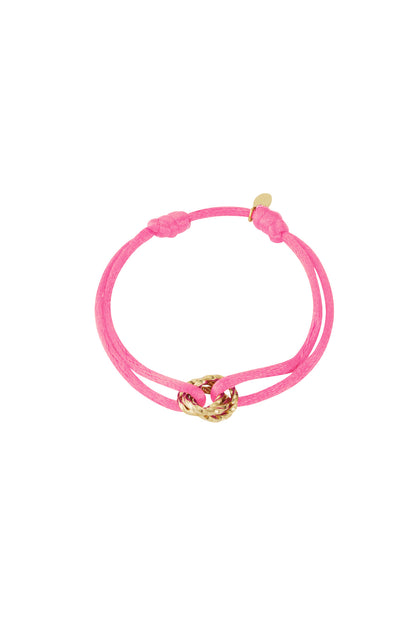 Pink knot charm bracelet with gold-plated twisted knot pendant on white background