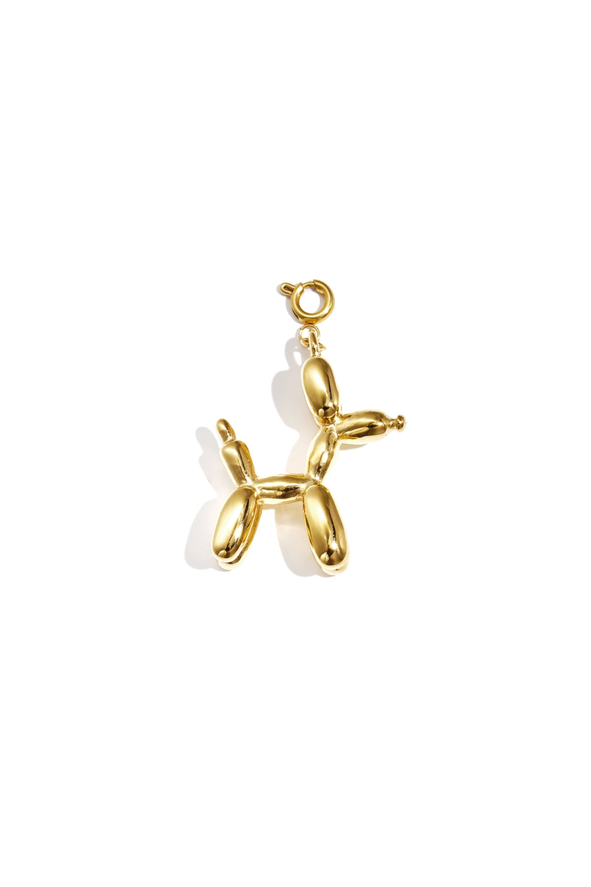 Gold balloon dog shaped charm with clasp on white background