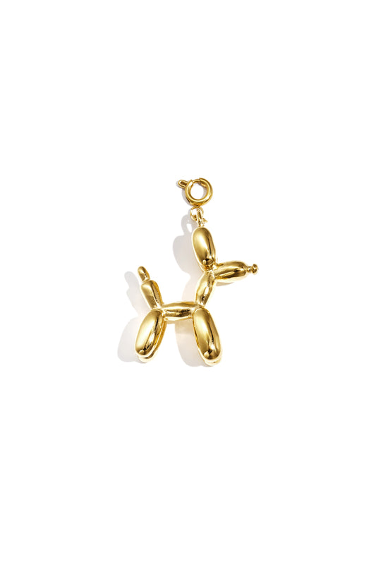Gold balloon dog shaped charm with clasp on white background