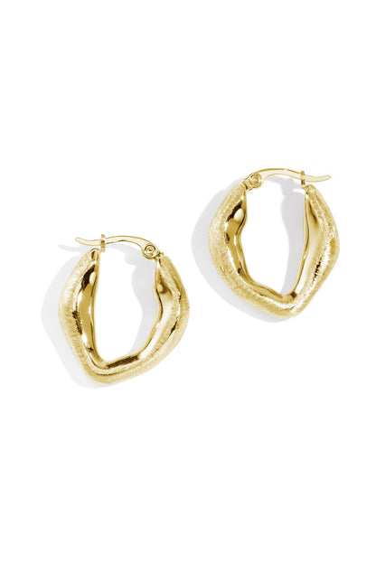 Pair of gold chunky hoop earrings with textured outer surface and polished inner finish on white background