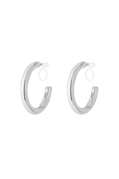 Pair of glossy chunky silver hoop clip-on earrings displayed on white background