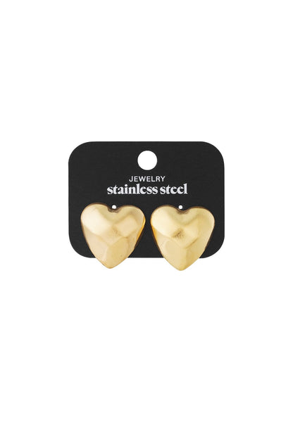 Matte gold, stainless steel heart-shaped stud earrings with a faceted, modern glitch design on a black display card.