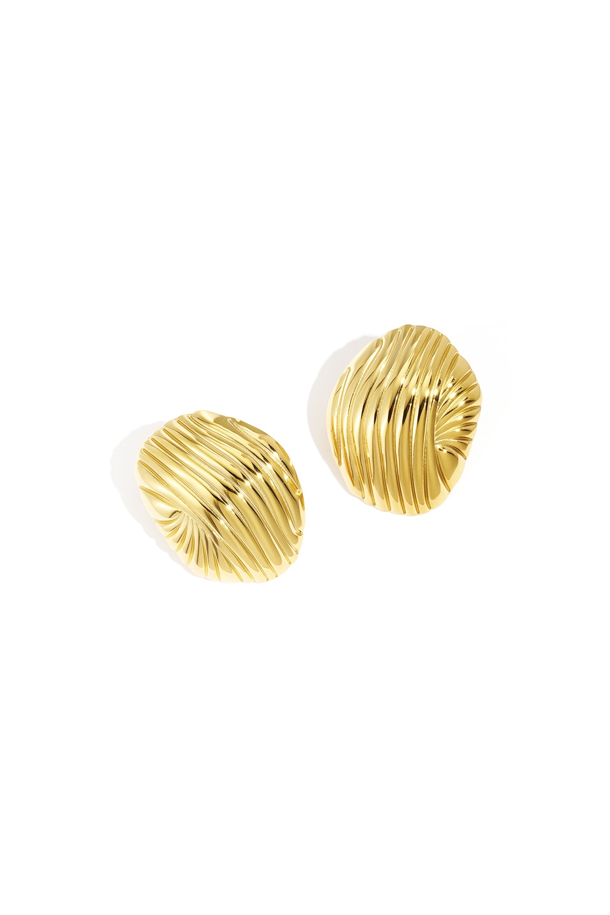 Pair of gold-tone rippled stud earrings on white background