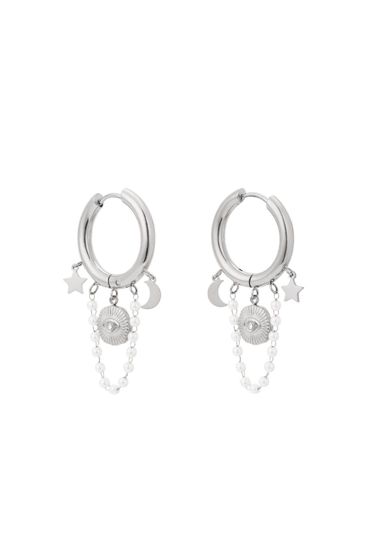 Pair of silver celestial charm hoop earrings with star, moon, sun motifs and pearl chain charms displayed on white background