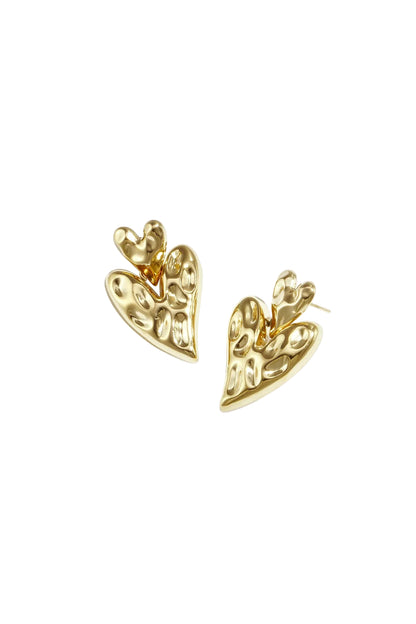 Pair of polished gold chunky heart-shaped drop earrings with hammered texture on white background