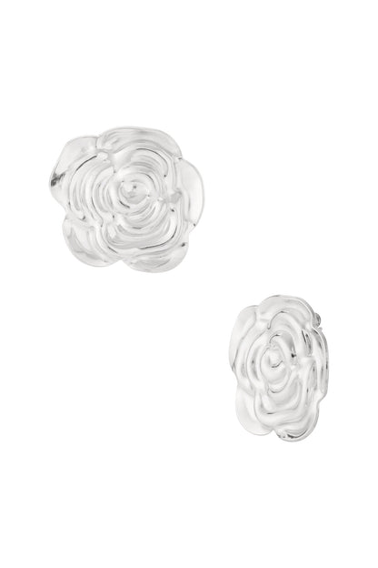 Pair of shiny silver flower-shaped stud earrings featuring the same detailed rose petal design on a white background