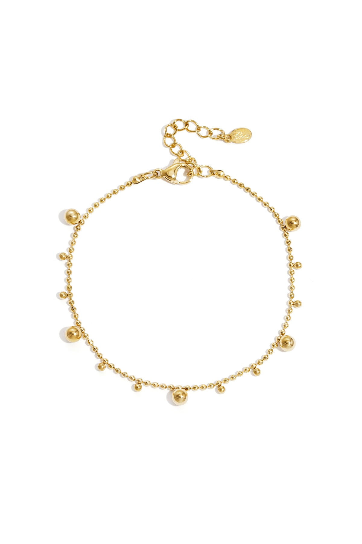 Gold-toned delicate beaded chain bracelet with alternating small and medium shiny balls and adjustable lobster clasp