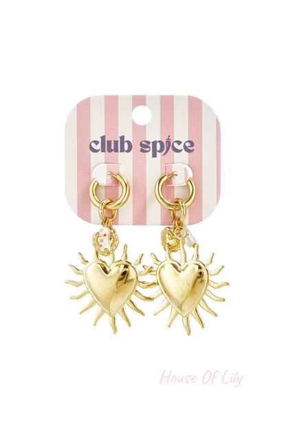 Gold-tone dangle earrings featuring a sun-shaped heart charm hanging from a small hoop on a pink striped display card.