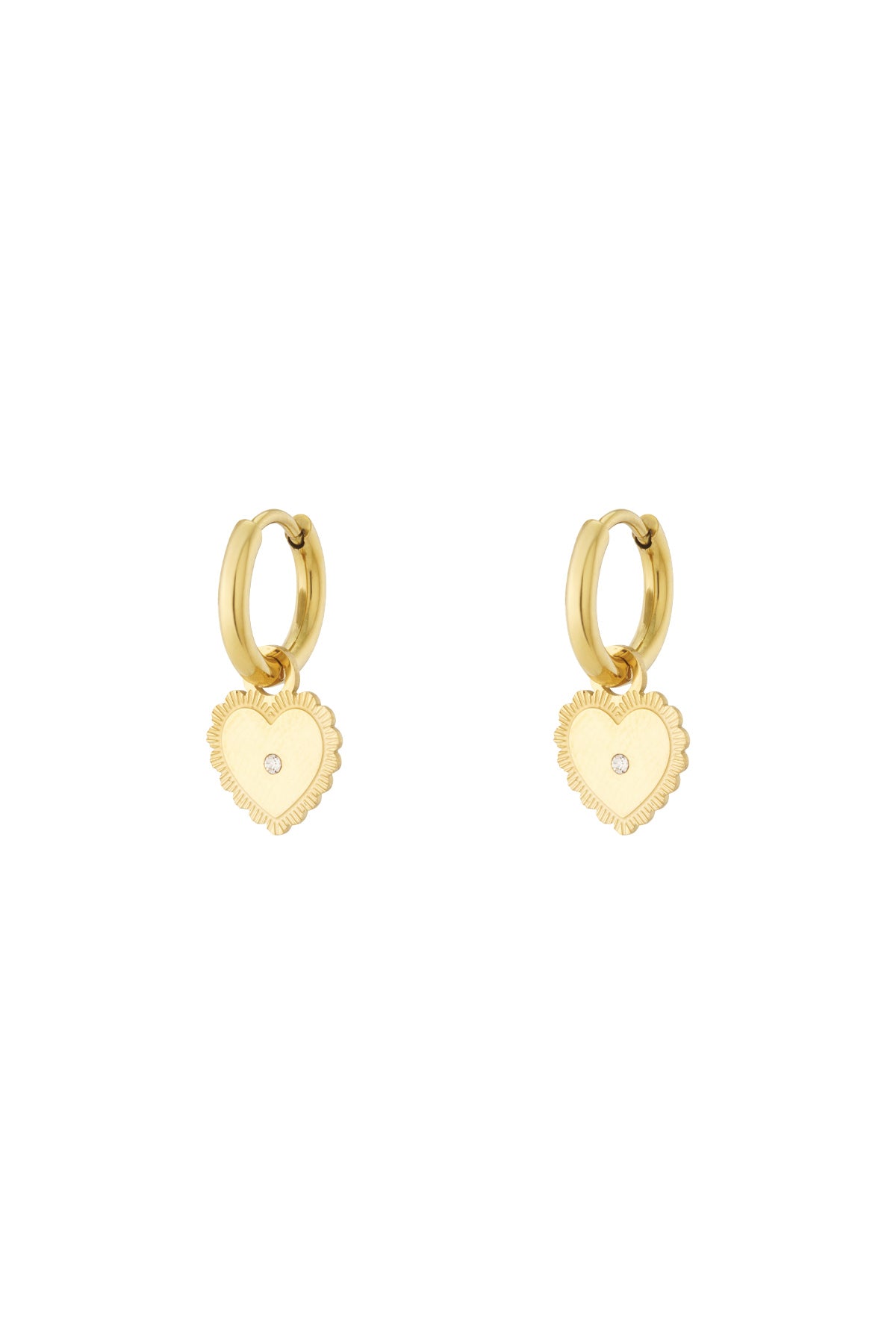 Gold hoop earrings with dangling heart charm featuring central rhinestone on white background