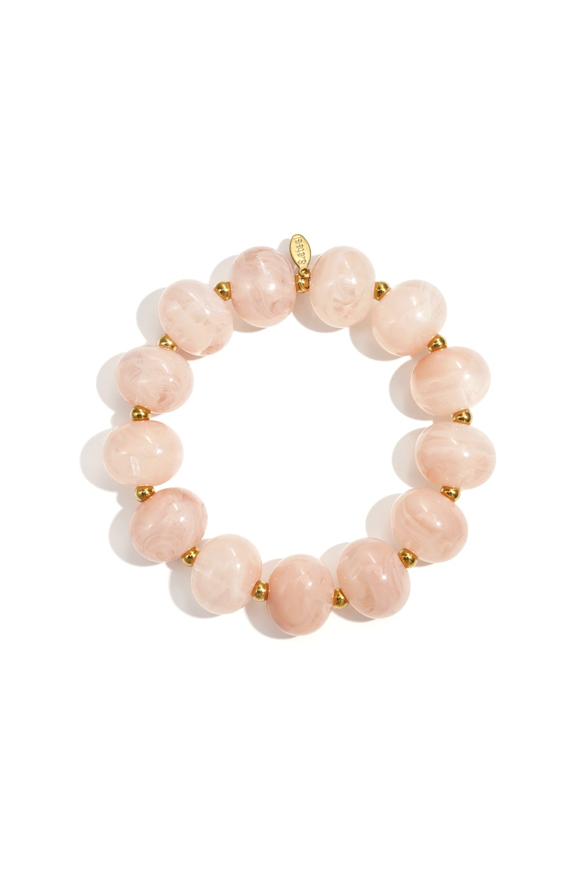 Soft pink marbled beaded stretch bracelet with gold accent spacer beads on white background