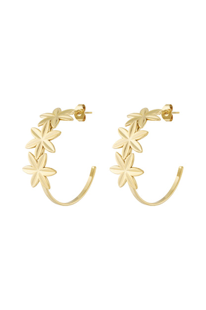 Pair of gold floral hoop earrings with three flowers on each hoop