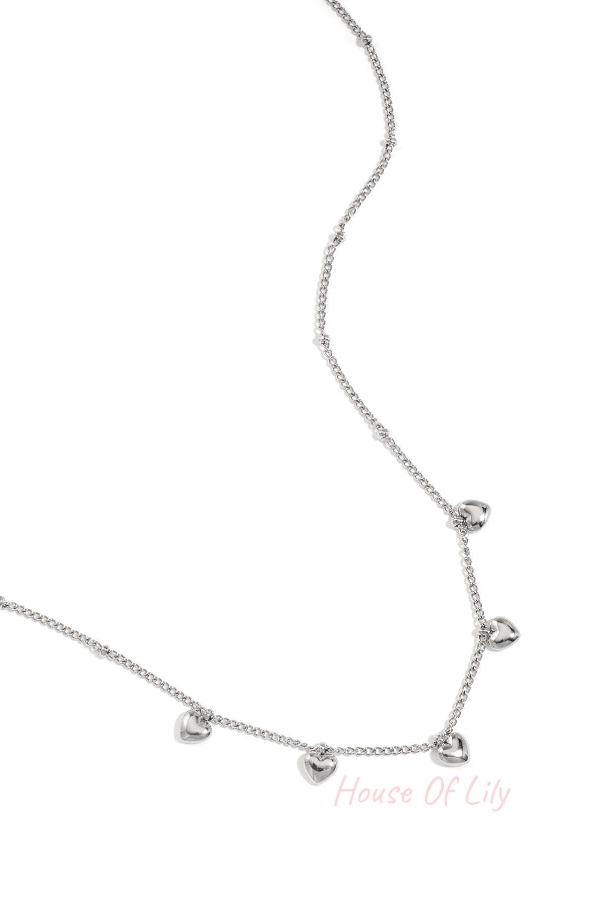Minimalist necklace with small hearts