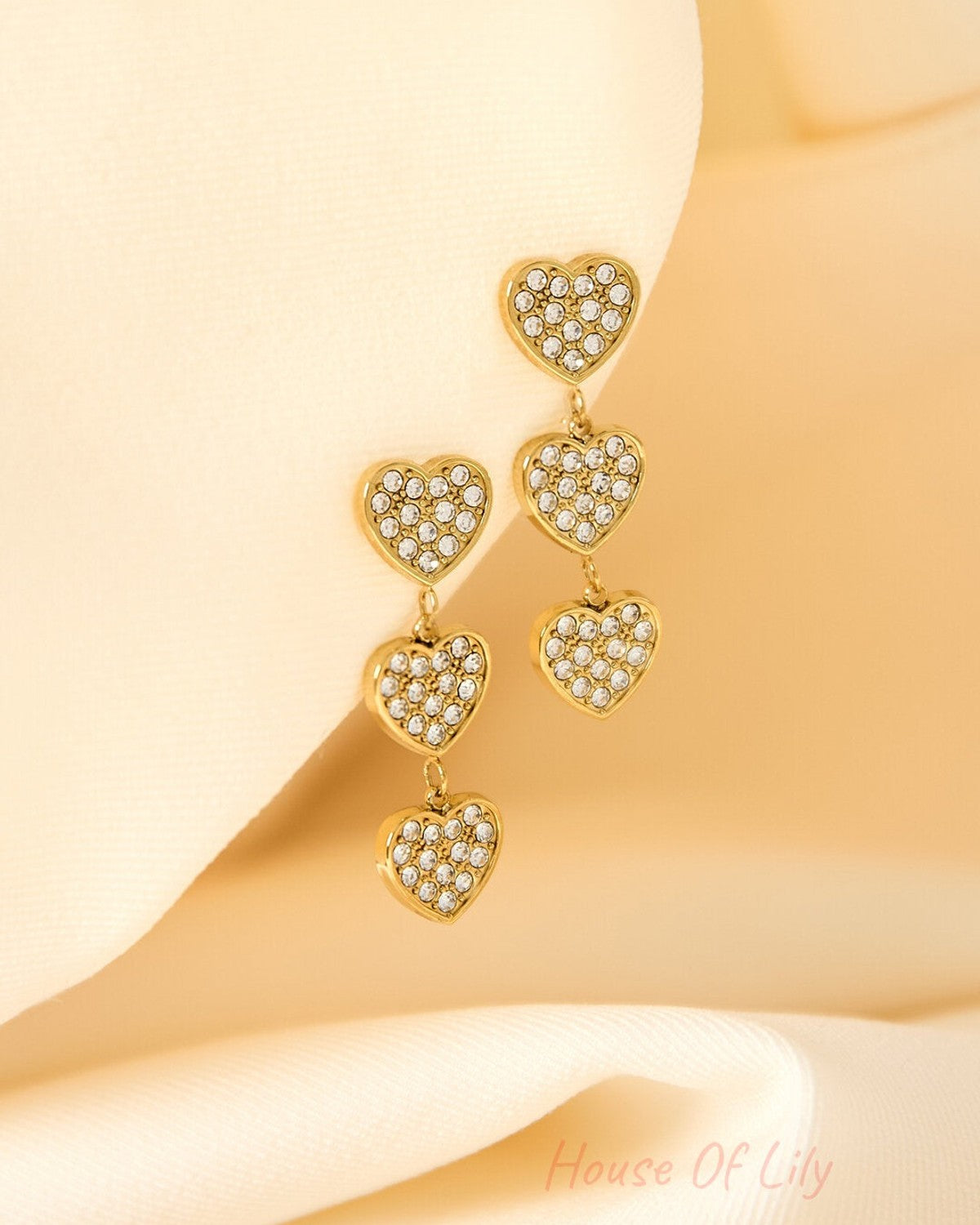 Earrings with 3 embellished hearts
