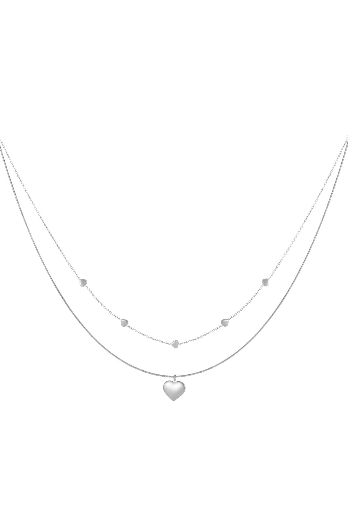 Silver double-layered necklace with small heart accents on one chain and a larger heart pendant on the other, isolated on white background