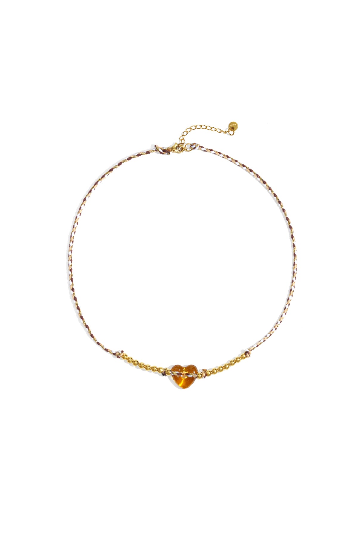 Braided beaded necklace with amber translucent heart bead and gold-tone beads on white background