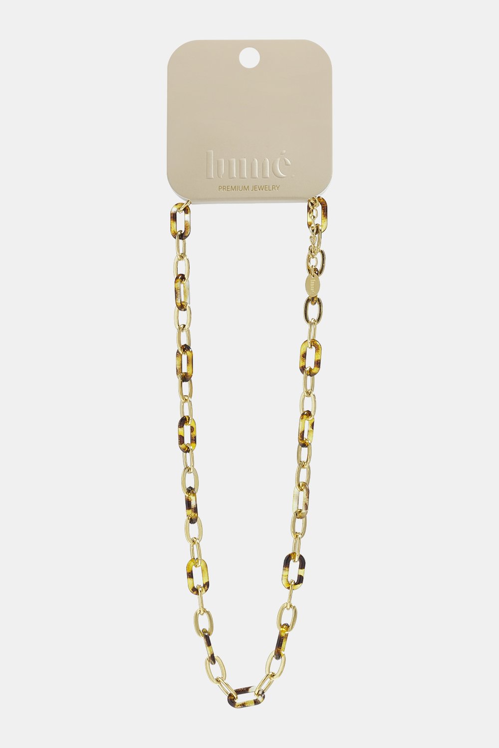 Tortoise Shell Core necklace: a gold-tone link chain interspersed with brown and gold tortoise shell pattern links.