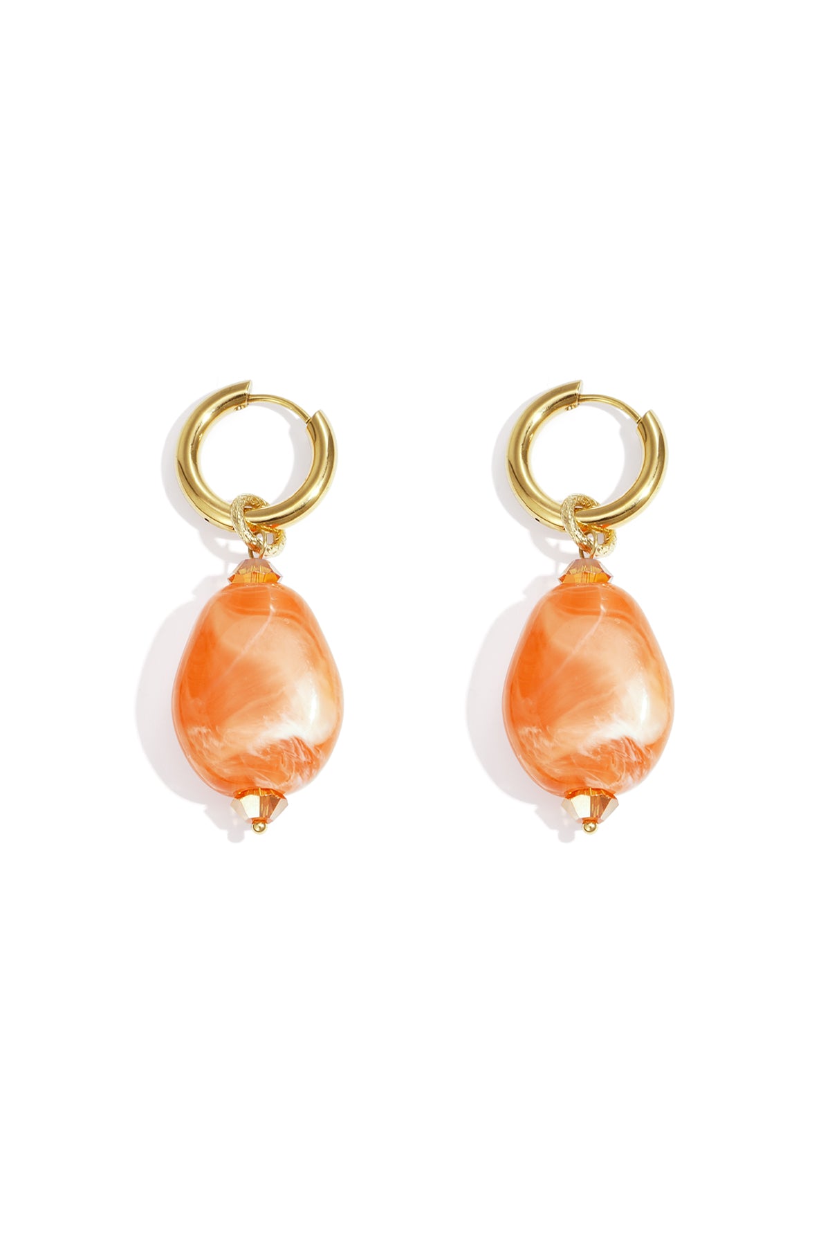 Pair of gold hoop earrings with orange cloudy resin beads