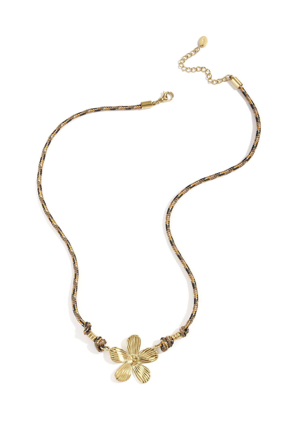 Gold-tone flower pendant necklace with braided multicolor cord laid flat white background