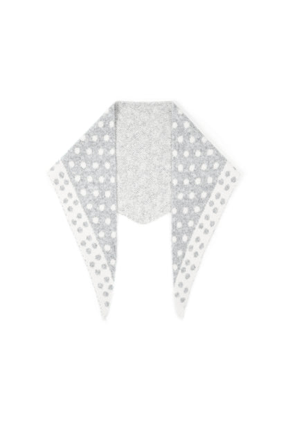 Gray and white polka dot triangle scarf folded flat showing both colors