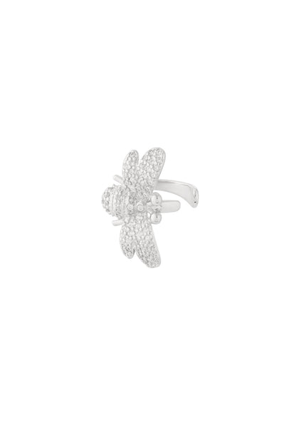 Close-up image of a silver ear cuff shaped like a bee with sparkling zircon crystals